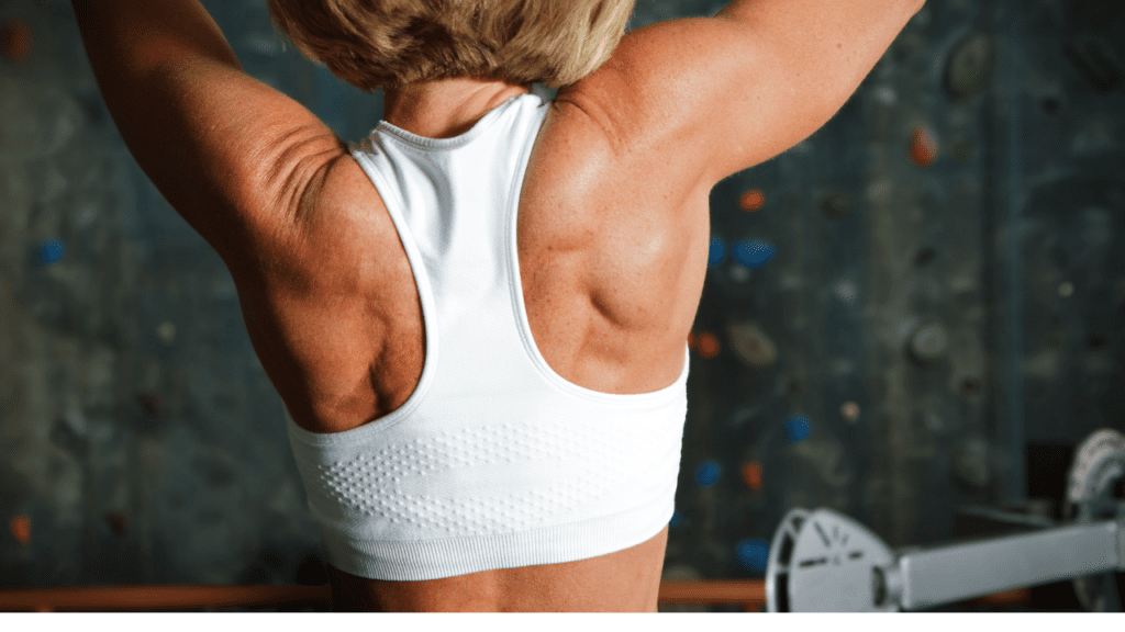 A woman utilizing Ipamorelin for Anti-Aging lifts weights in a gym.