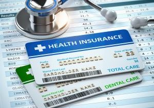 Health Insurance cards total and dental care with stethscope. 3d illustration